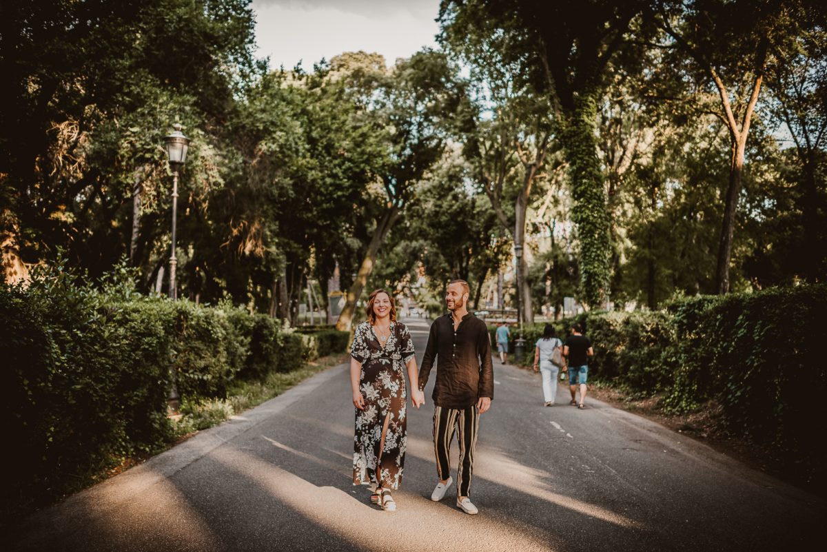 Couple walking in Villa Borghese